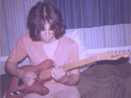 Practicing guitar in bedroom, Beachwood, Ohio, circa 1975 - click to enlarge