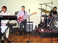 Performing at 40th Beachwood High School Reunion, July 3, 2010.  Darryl Berk is on guitar at right. - click to enlarge