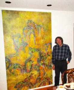 With one of his paintings