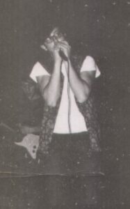 Mark Jones blowing harp in Mo Schwartz Blues Band, Cleveland
